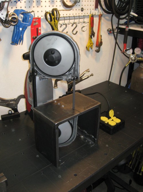 Portable Band Saw being used with a 'Vertical' Tabletop Stand